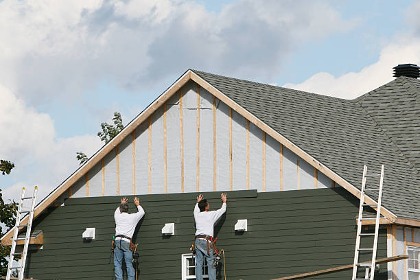 Professional Siding Contractor technician working in Grove City, OH
